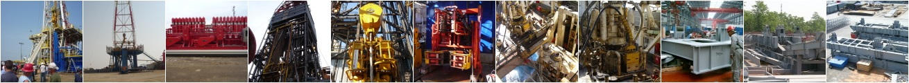 Industrial machinery with red and yellow components inside a factory setting.